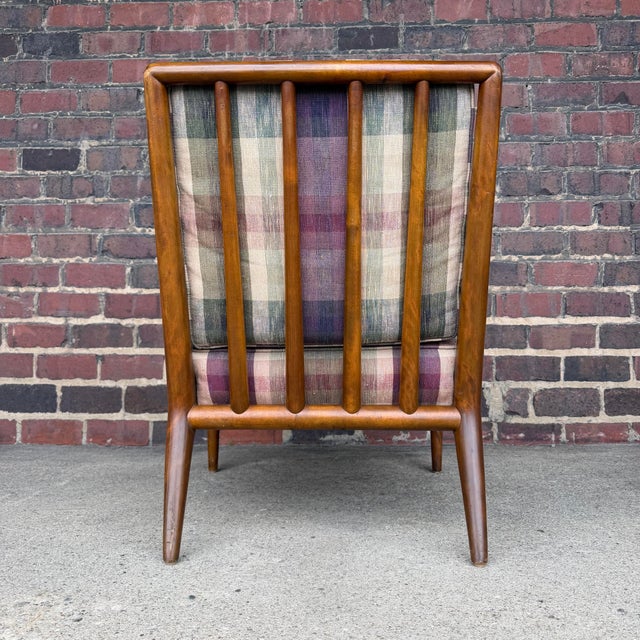 lounge chair and ottoman designed by Robsjohn-Gibbings for Widdicomb. This sculptural Mid-Century Modern set features...