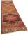 This exquisite runner rug is a rare example of tribal craftsmanship, hand-knotted by the women of the Herki tribe during...