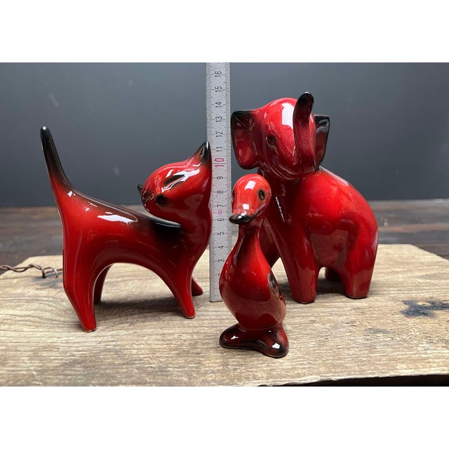 The cat has a small damage to its tail. No glaze. Please note the arrow. I have official proof of authenticity such as...