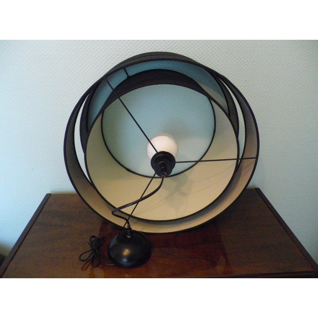 Large pendant light from the late 1980s with a triple black fabric outer shade; the central shade is 40 cm in diameter,...