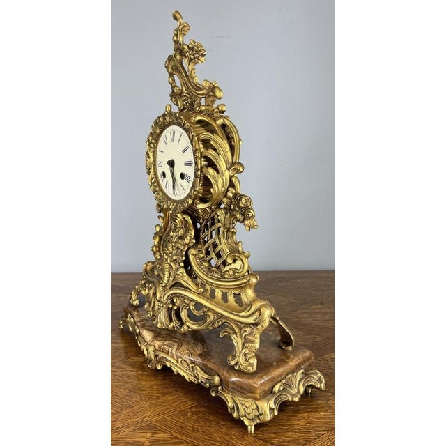 This elegant Vintage French Rococo / Louis XV Revival mantel clock , dating to the late 19th–early 20th century (circa...