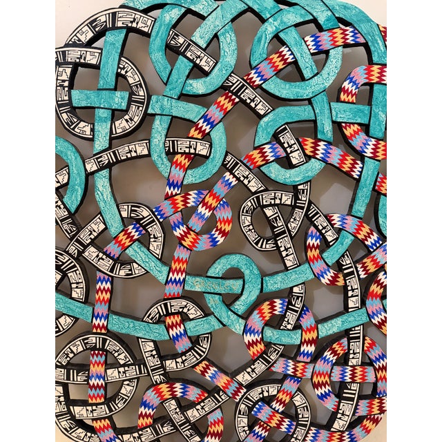 Striking hand-carved wood wall sculpture by Santa Fe artist Charles Greeley, dated 1986. This large-scale decorative piece...