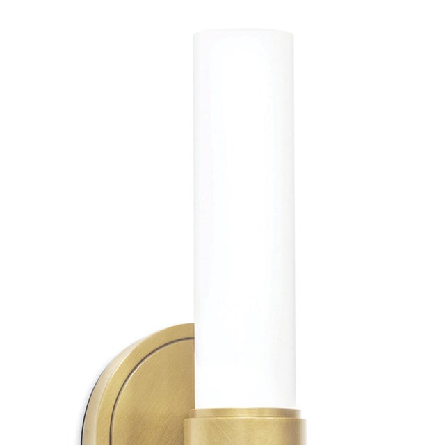 With its sleek and streamlined design, this wall sconce is perfect for any space in need of a modern touch. The Dixon...