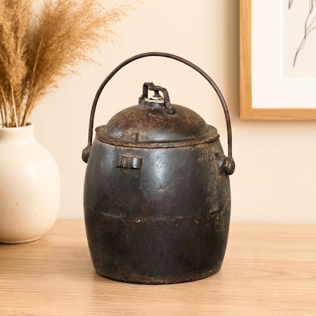 Dimensions: 8" W x 8" D x 13" H This antique iron bucket is made from double walled metal and is very heavy. Add this...