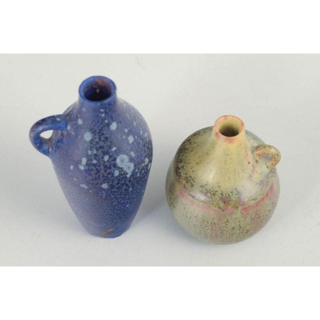 Carl-Harry Stålhane for Rörstrand, two miniature pitchers. Set comprising two miniature thrown stoneware pitchers with...