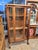 Antique Tiger oak china/display cabinet. Empire style. Beautiful clean lines. The bowed glass door adds to the charm of...