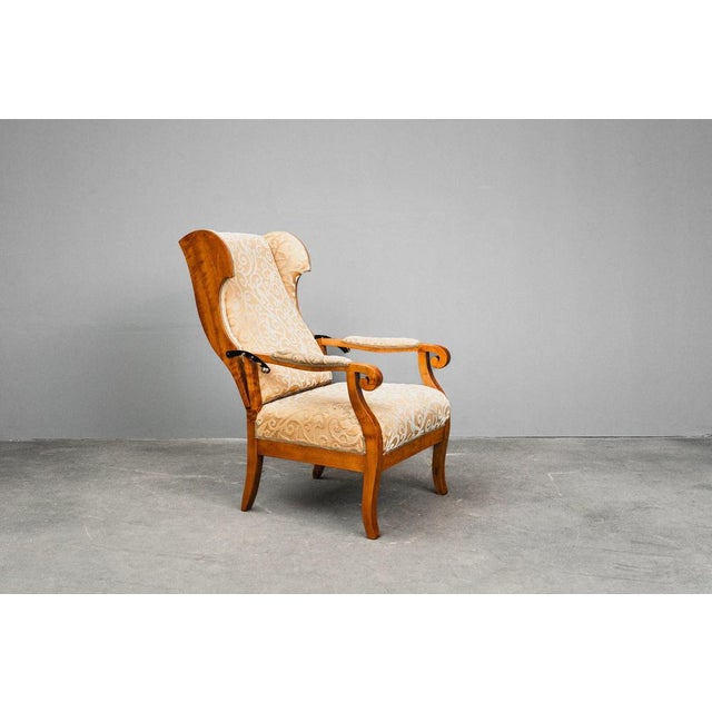 Item: Adjustable wingback chair Period & Style: Biedermeier - first half of the 19th century Features: - Comfortable and...