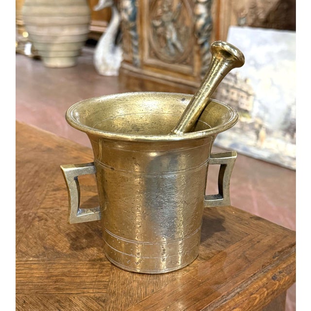 This handsome antique French mortar and pestle combines a substantial form with a beautifully aged bronze surface. Crafted...