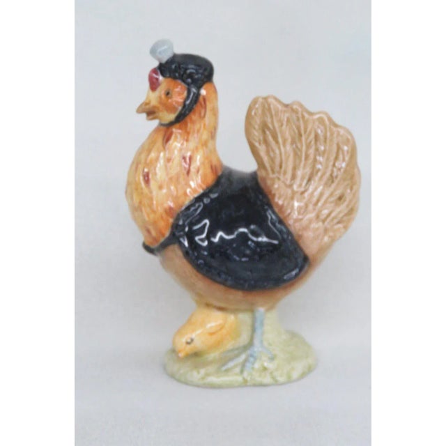 This wonderful figurine is made of porcelain. This piece is stamped as being made in 1974 by Beswick in England, see...