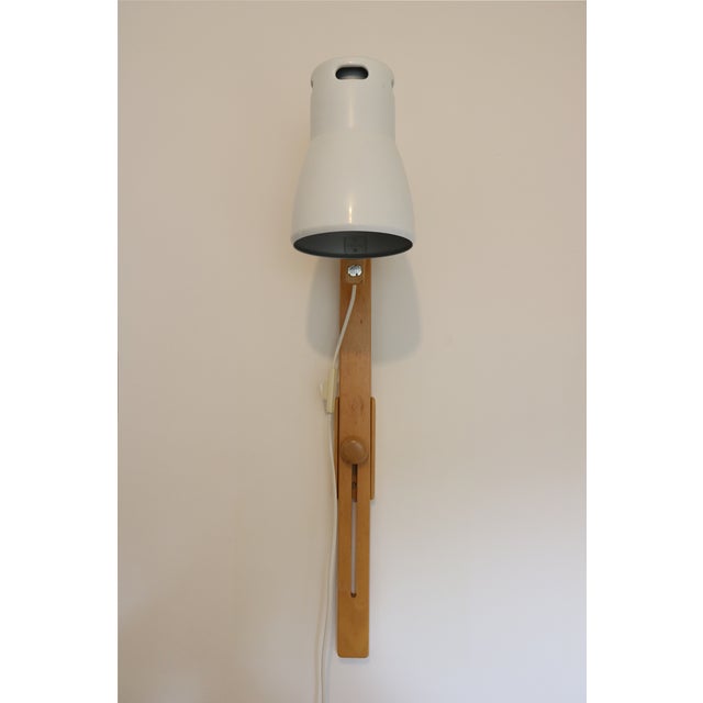 Adjustable wall lamp, model v 437, by hans agne jakobsson for ab markaryd, sweden. in excellent condition despite its age....