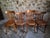 A set of four antique French bistro chairs dating from the 1930s, consisting of two different but complementary models by...