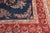 An authentic early 20th-century room size Persian Mohajeran Sarouk carpet in predominantly navy Measures: 8'9''x 11'11"...
