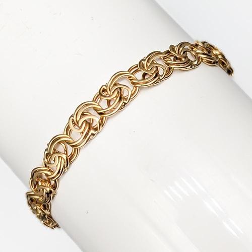 Bracelet, Gold, Fantasy Link, 18K, 8.32g, Length: 19cm, Width: 5mm, Good condition. Stamped: R&C This piece has an...