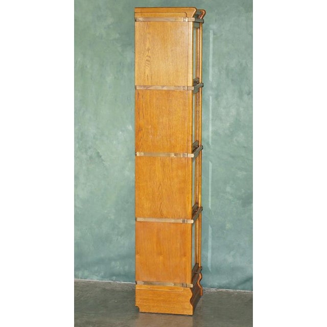 Antique Modular Honey Oak and Gilt Brass Stacking Bookcase with Glazed Retracting Doors For Sale - Image 6 of 18