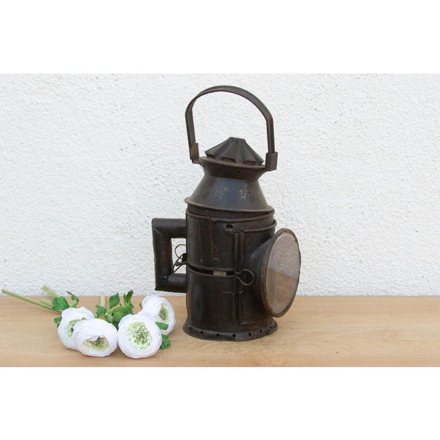 A rugged relic of the steam age, this antique railway lantern was originally designed to withstand the harsh conditions of...