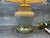 Beautiful vintage Mid-Century Modern porcelain and brass table lamp featuring a timeless blend of elegance and...