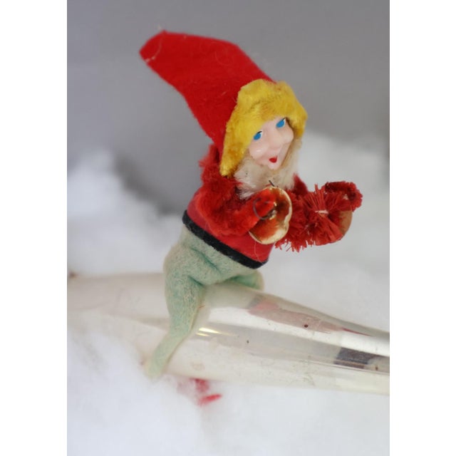 Vintage 1950s Shiny Brite mercury glass rocket Christmas ornament featuring a whimsical felt-clad elf astride a silvered...