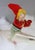 Vintage 1950s Shiny Brite mercury glass rocket Christmas ornament featuring a whimsical felt-clad elf astride a silvered...