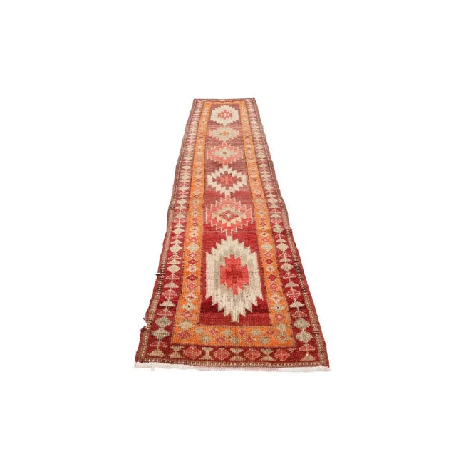 Handknotted vintage decorative Herki runner from Northern Iraq. Approximately 50-60 years old. In very good condition.