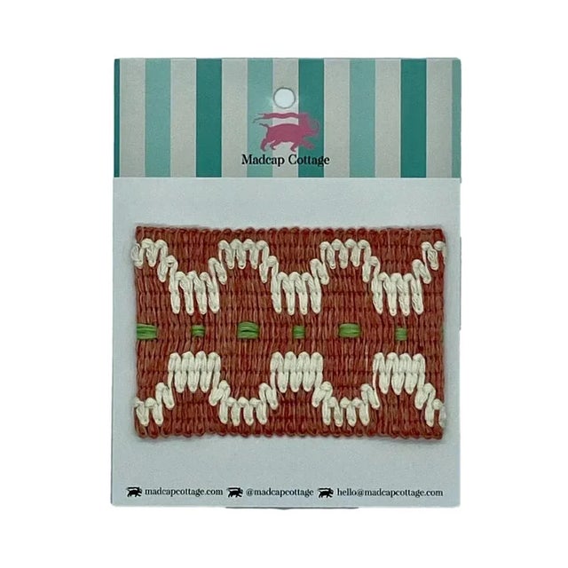 She skipped up the steps of the ancient Greek temple, a vision in decadent prints and patterns in a sea of tired white...