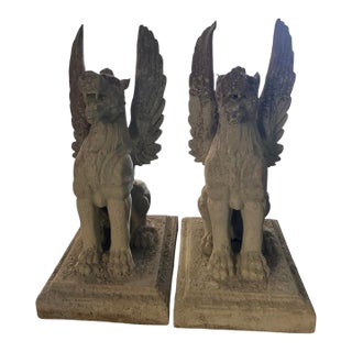 Pair of Monumental Neoclassical Cast Iron Winged Griffin Statues For Sale