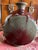 This unique mid-19th century double-drum wine bottle/vase is a fine example of Asian ceramic art. It features a rich...