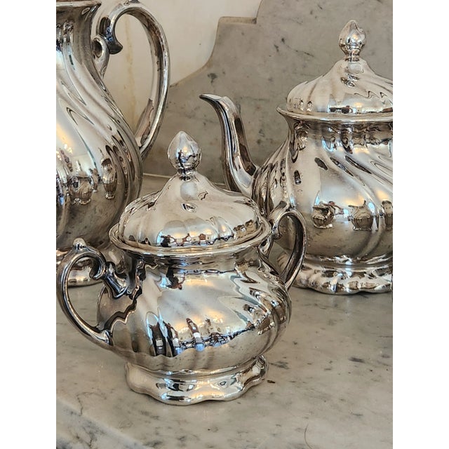 Vintage WMF Lustre Coffee Pot, Tea Pot, Creamer & Sugar Bowl w Lid, Art Deco, Made in Germany. Silver on porcelain. WMF...