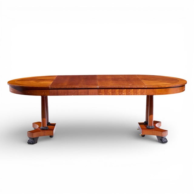 Baker Furniture Neoclassical Cherry Wood Expanding Dining Table with 2 Leaves This table measures: 46 wide x 46 deep x 30...