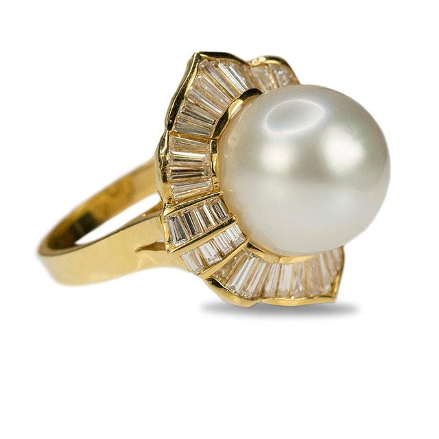 18k Ring with 13.5mm South Sea Pearl and 46 baguette cut diamonds weighing approximately 2.00 carats. 10.48 grams size 6.5