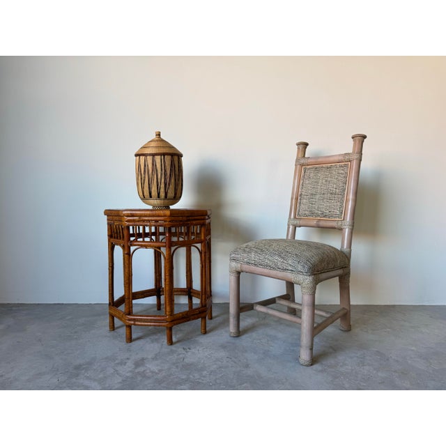 A beautifully crafted vintage side table in the Brighton Pavilion style, featuring an octagonal top and intricate bamboo...