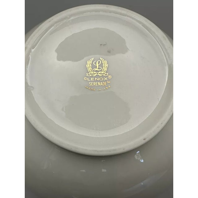 This vintage Lenox porcelain vase is a beautiful addition to any collection. vase features hand-painted bird designs, part...