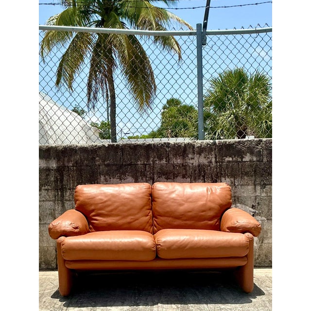 Indulge in the iconic comfort and sculptural elegance of this vintage "Coronado" loveseat, a masterpiece designed by Tobia...