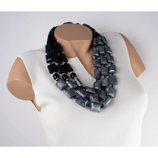 An outstanding resin choker-beaded necklace, designed by Angela Caputi and made in Italy. The multi-strand piece features...