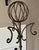 This Wrought Iron freestanding Coat & Hat Rack or Hall Tree in gray is a distinctive and stylish piece that combines...
