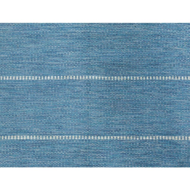 Vintage Swedish Blue Flat Woven rug by Ingegerd Silow Size: 5'6" × 7'5" (167 × 226 cm) A striking example of Scandinavian...