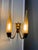 Discover the epitome of mid-century modern elegance with this stunning set of sconce lamps by Angelo Lelii for Arredoluce,...