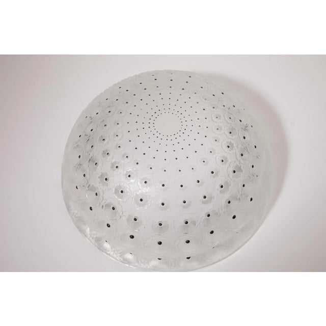 French Lalique crystal bowl "Nemours" model was created in 1929. this piece was created circa 1945 This piece has an...