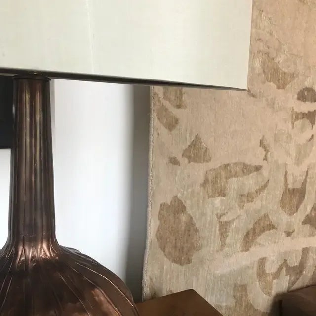 Gorgeous table lamp in a hammered and torched copper, gourd shaped, on acrylic base, included the shade.