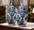 This elegant pair of vintage Delft ginger jars combines classic Dutch blue-and-white decoration with a richly detailed,...