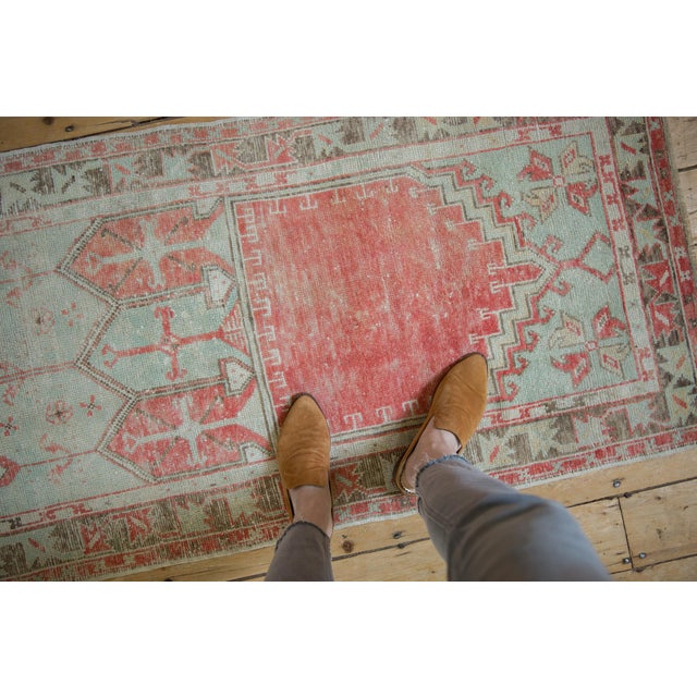 :: Dual center panel design motif with top portion in a prater design and lower bearing long stemmed germinating plants in...