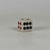 A large white marble with red and black count game dice for decorative decor and home accent. Circa: Late 20th Century...
