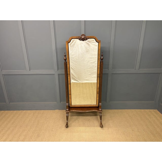 A very good early 20th century walnut cheval mirror in the Queen Anne style. Of good construction and fitted with its...