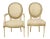 Six French Louis XVI style dining chairs, with oval medallion backs, ribbon twist molding. and patterned upholstery with...