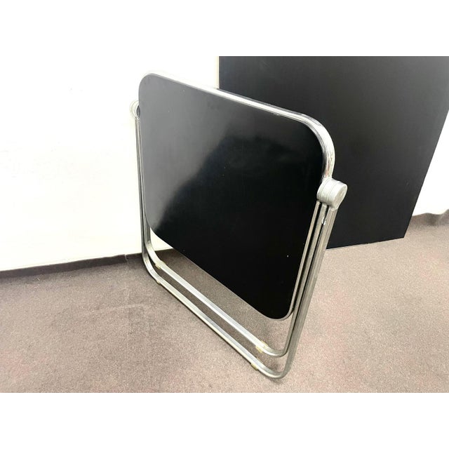 Iconic "Platone" folding side table designed by Giancarlo Piretti for Anonima Castelli in 1971. A classic piece of Italian...