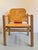 Simple and functional. The inserted leather panel allows the seat and backrest to flex slightly during use. I have...