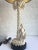 Mid-Century chinoiserie style plaster and wood palm tree lamp by Chapman. Base features detailed palm tree and musical...