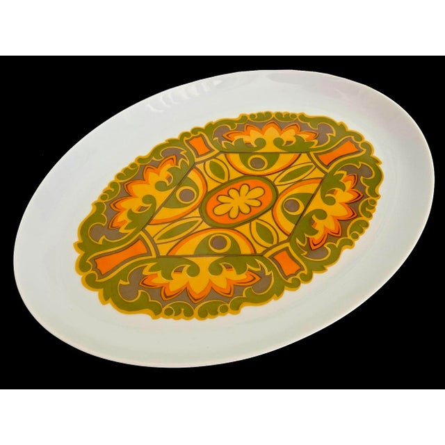 Offered is a ceramic oval platter in the Aquarius Libra pattern by Sango. The design on the platter is reminiscent of...