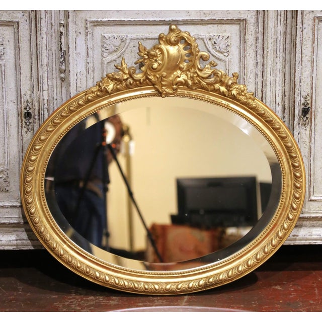 Late 19th Century 19th Century French Louis XV Oval Giltwood Wall Beveled Mirror With Crest For Sale - Image 5 of 7