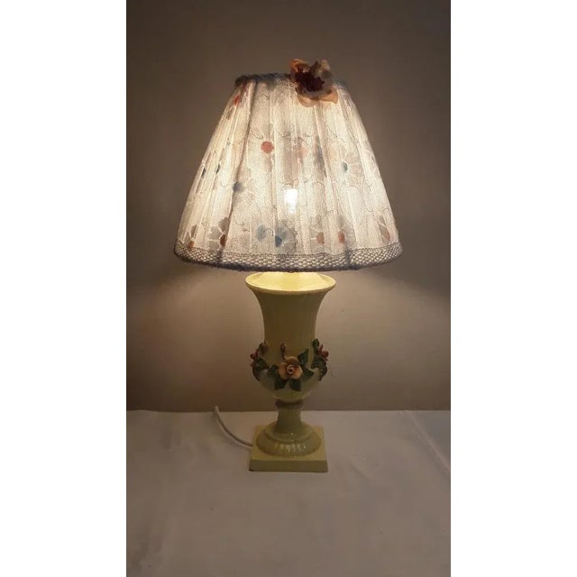 Vintage Table Lamp with Yellow Flower-Decorated Ceramic Base, 1970s, in Very Good conditions. Designed 1970 to 1979...
