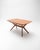 Extendable mid-century dining table inspired by the classic Helicopter Table design by G-Plan (UK, 1960s). This piece...